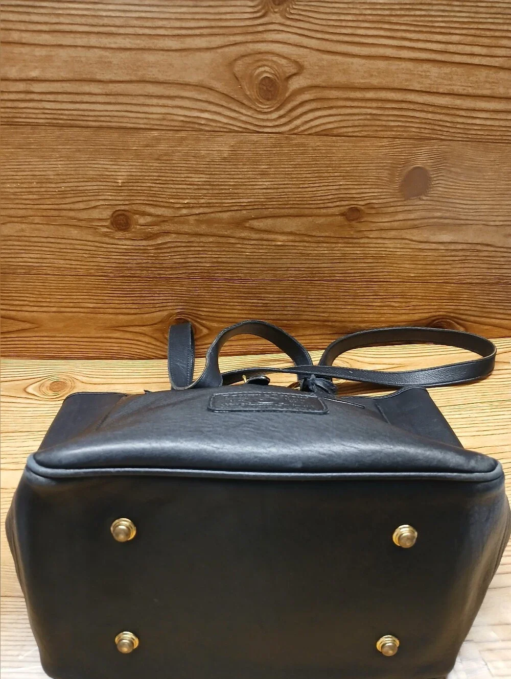 Dooney & Bourke Black Leather Tote with Gold Charm
